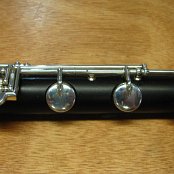 B-Foot, African Blackwood with Sterling SIlver keywork, Keycups are hand-made and soldered onto silver castings, Stainless steel rod-screws and blue steel needle springs, the Eb post is soldered onto the ferrul e which is held by locking screws