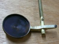 Key-cup part after silver soldering the key-rod and needle spring hook