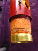 A brass ring is turned to fit onto the skimmed down tenon